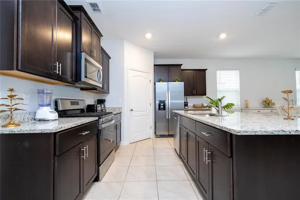 a kitchen with a cabinets and counter space
