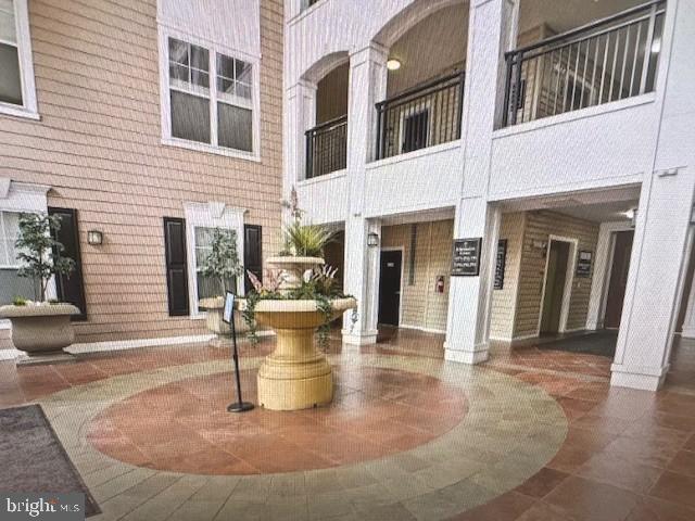 501 Hungerford Drive, Unit 445 Rockville, MD 20850 - Photo 2 of 18 Lovely fountain in the atrium