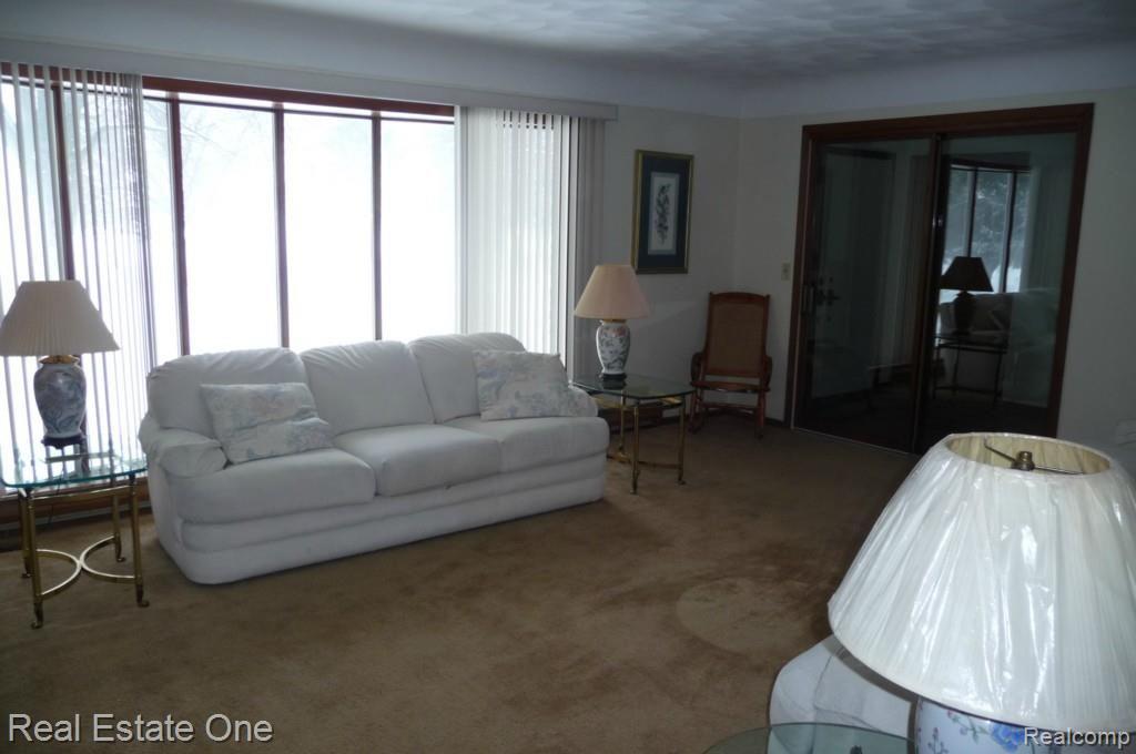 5981 West Hayner Road Fowlerville, MI 48836 - Photo 8 of 31 LIVING ROOM FROM DINING ROOM