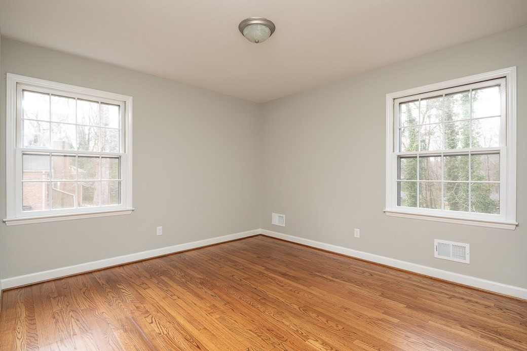 8913 Hunting Trail Raleigh, NC 27613 - Photo 10 of 19 The spacious master bedroom offers a fully remodeled bathroom. Master Bedroom