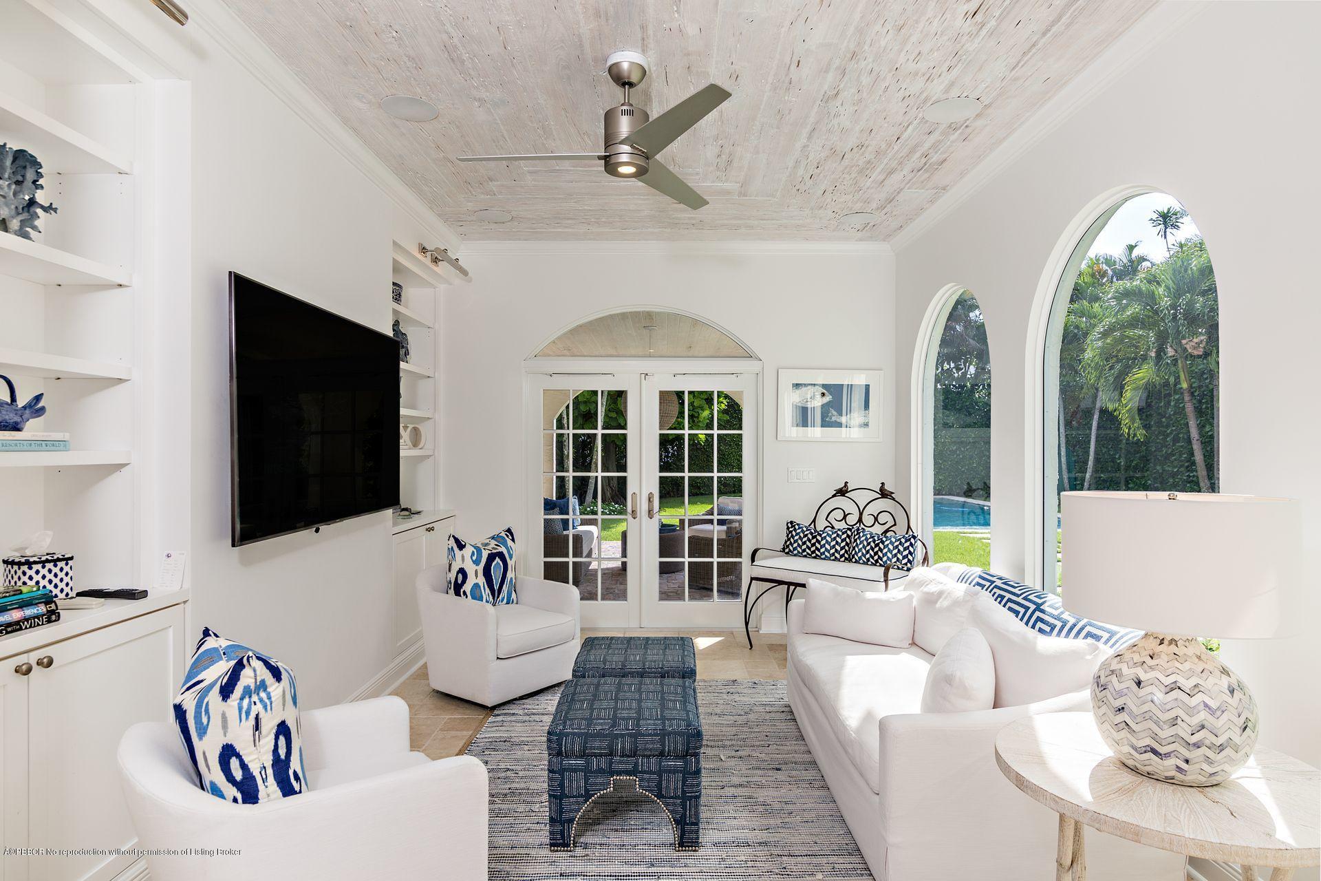 194 Pershing Way West Palm Beach, FL 33401 - Photo 14 of 50 a living room with furniture fireplace and a flat screen tv