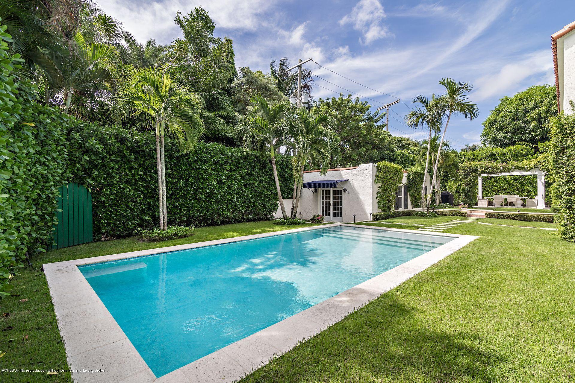 194 Pershing Way West Palm Beach, FL 33401 - Photo 25 of 50 a view of a swimming pool with a patio