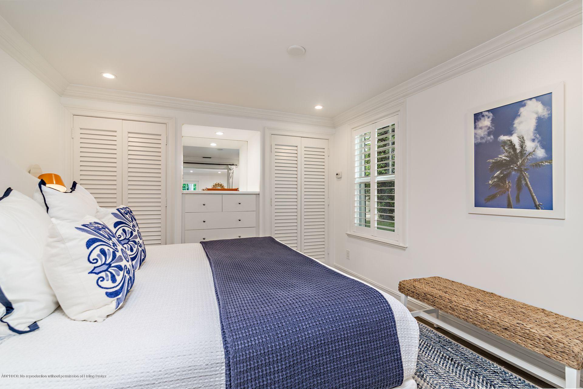 194 Pershing Way West Palm Beach, FL 33401 - Photo 29 of 50 a bedroom with a bed and window