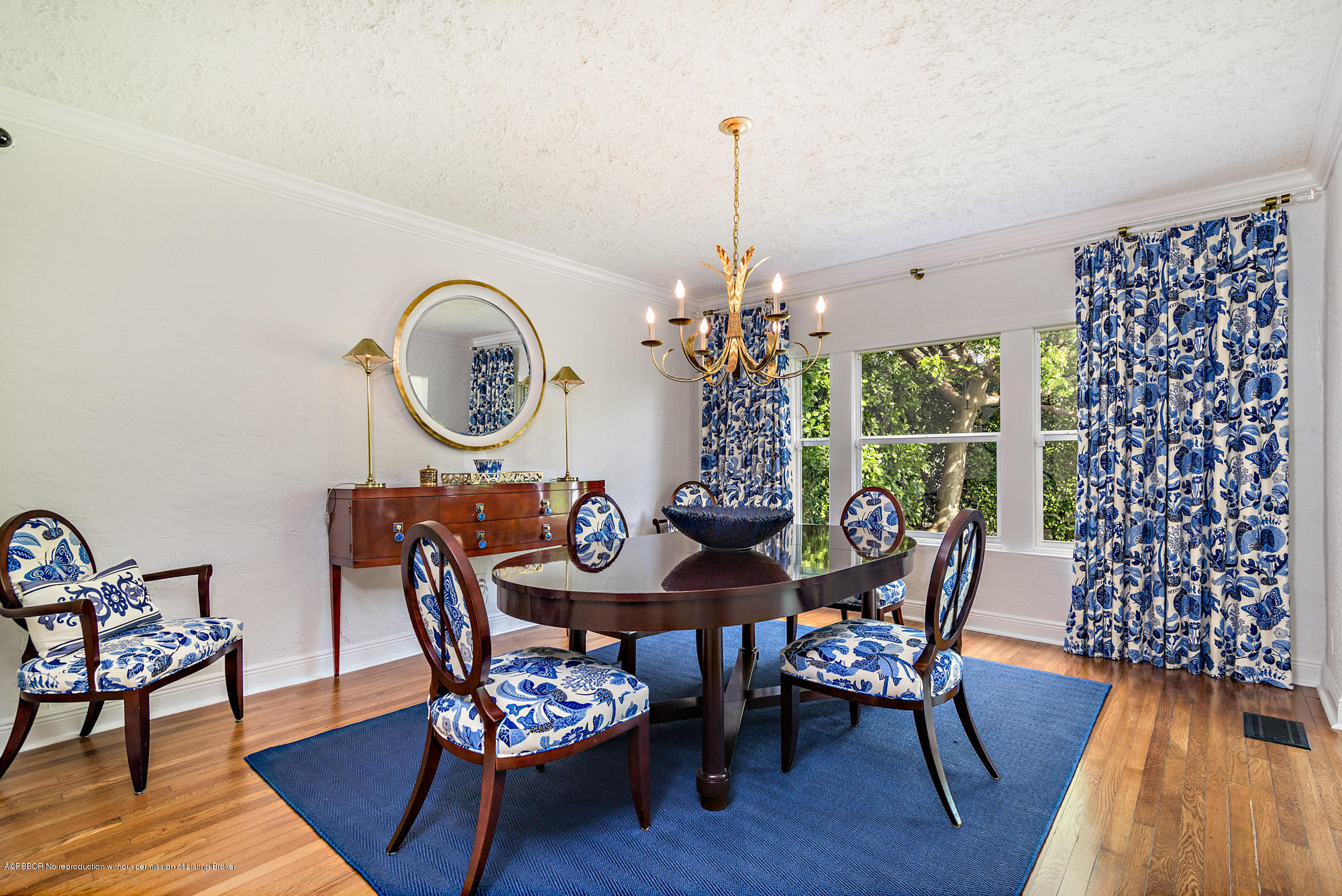 194 Pershing Way West Palm Beach, FL 33401 - Photo 4 of 50 a dining room with furniture a chandelier and wooden floor