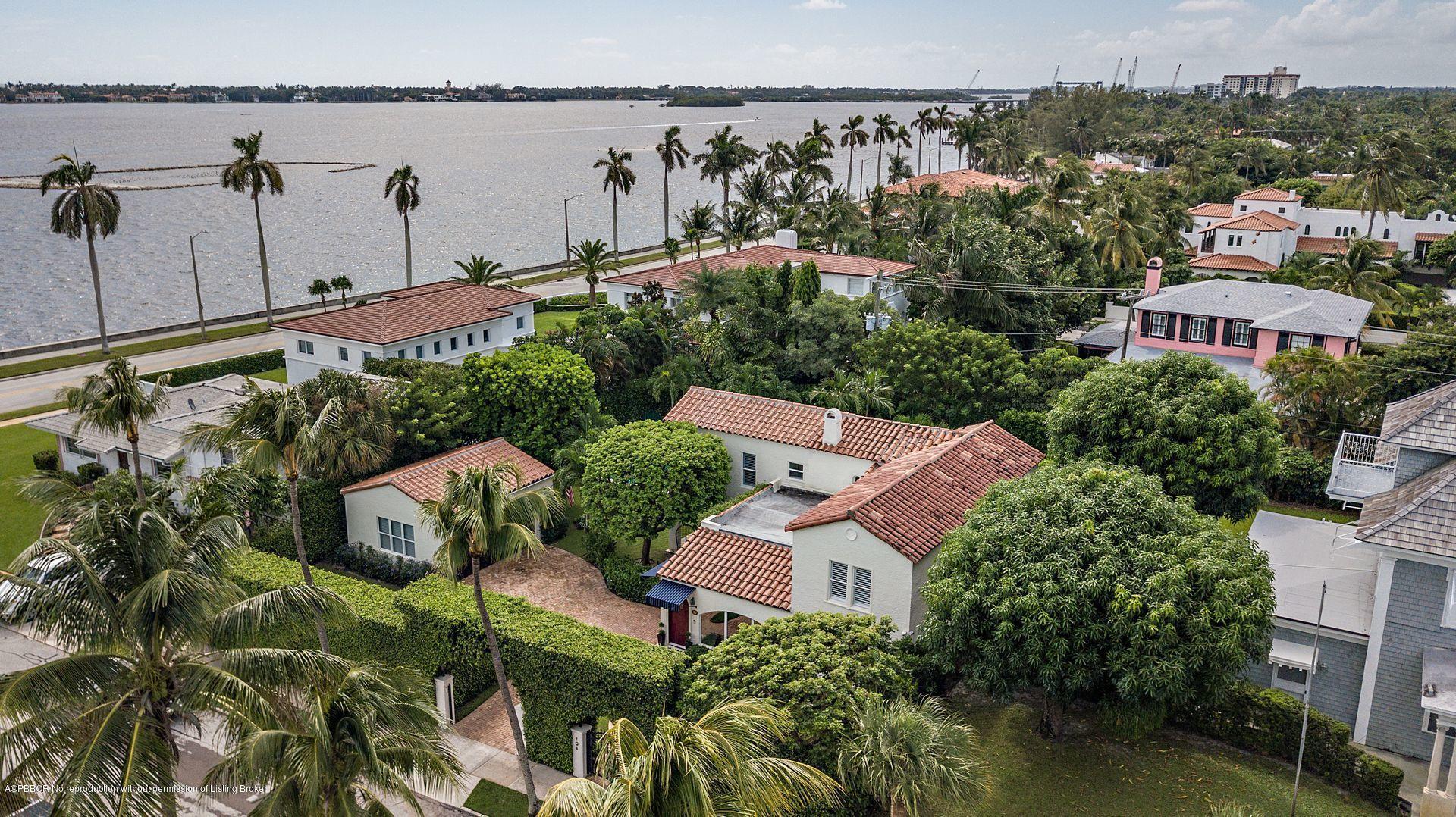 194 Pershing Way West Palm Beach, FL 33401 - Photo 36 of 50 an aerial view of a house with a yard and lake view