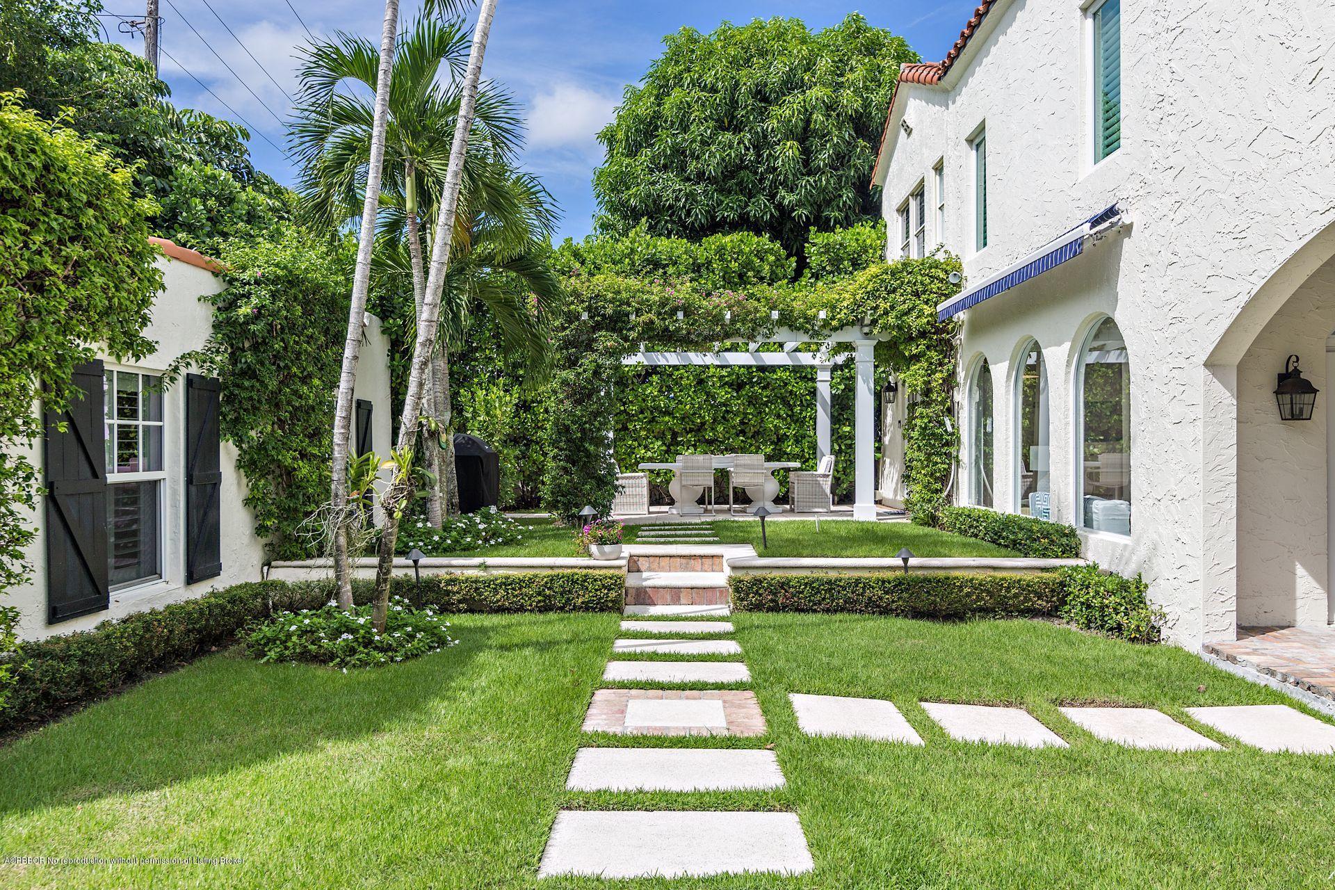 194 Pershing Way West Palm Beach, FL 33401 - Photo 5 of 50 a view of a house with a yard