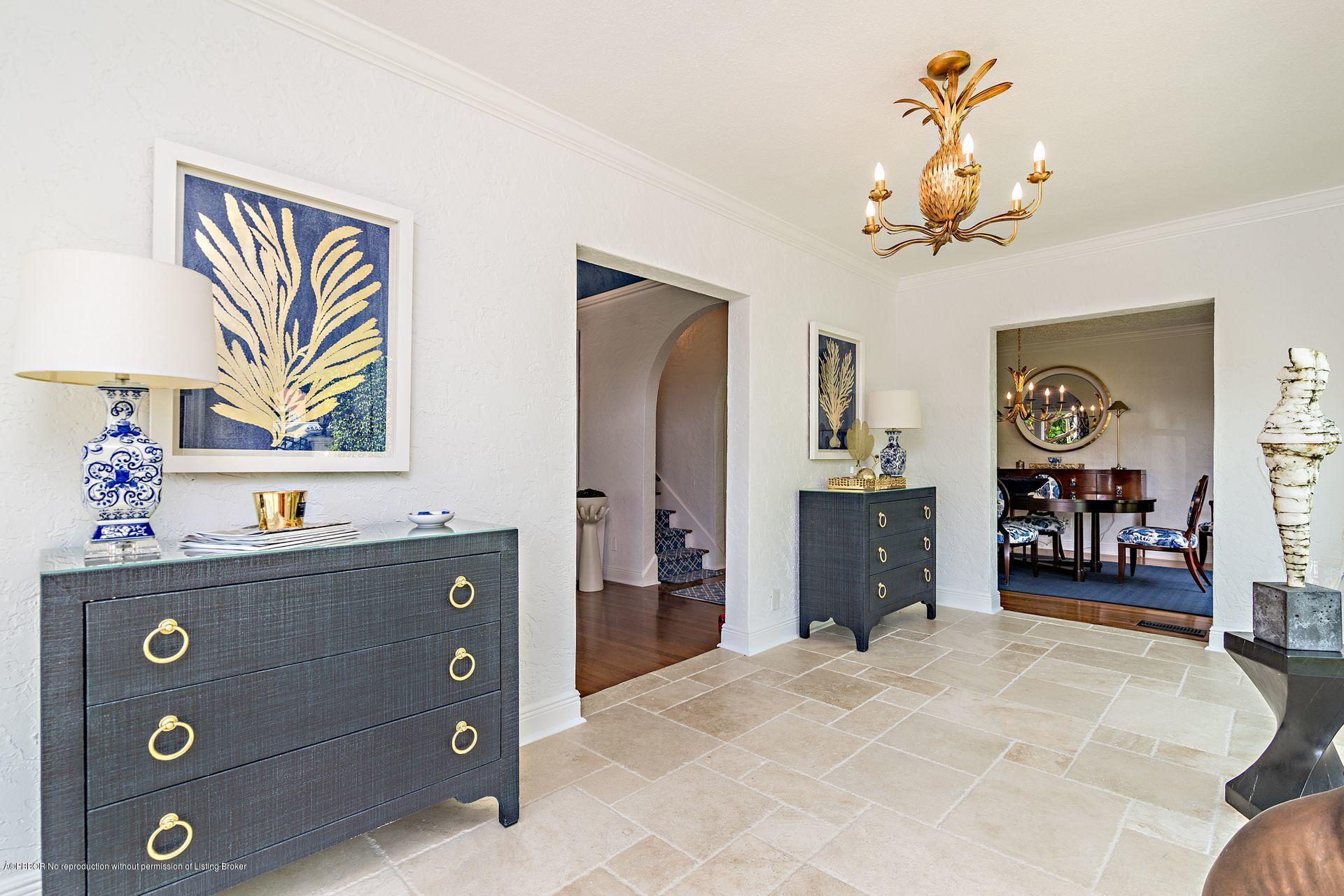 194 Pershing Way West Palm Beach, FL 33401 - Photo 41 of 50 a bedroom with a bed and a dresser in it