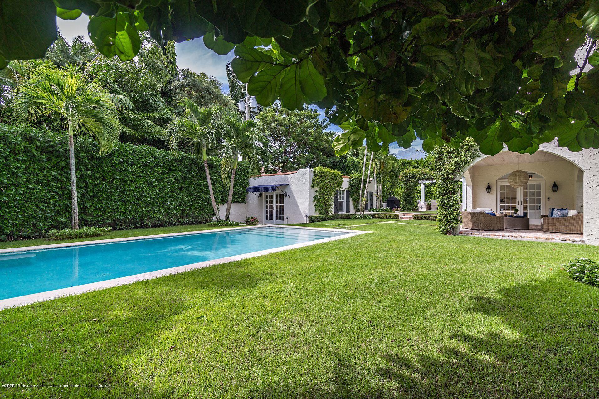 194 Pershing Way West Palm Beach, FL 33401 - Photo 47 of 50 a view of a house with pool and sitting area