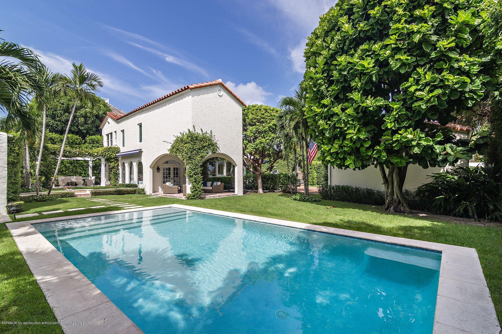 194 Pershing Way West Palm Beach, FL 33401 - Photo 7 of 50 a view of a house with swimming pool and a yard