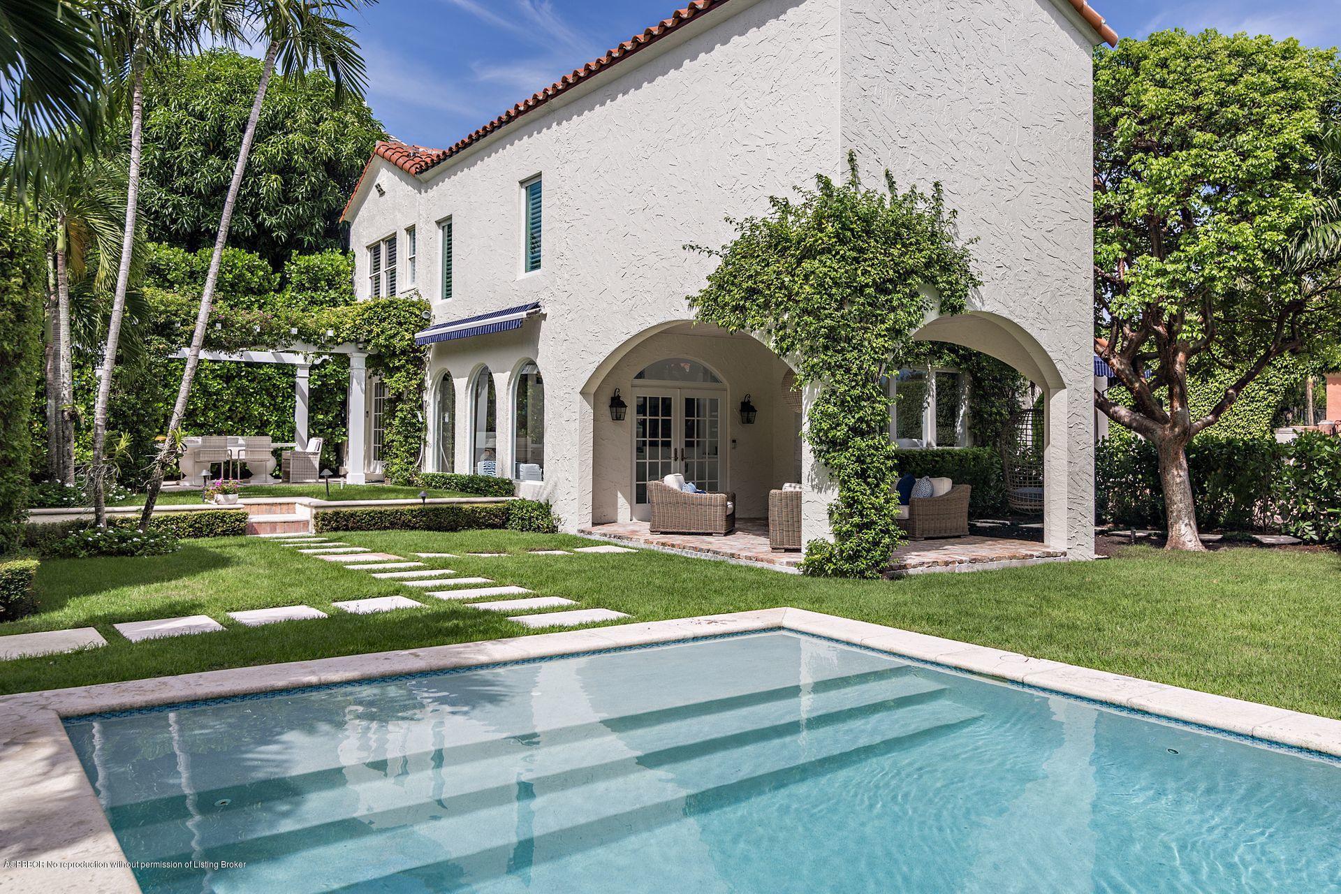 194 Pershing Way West Palm Beach, FL 33401 - Photo 8 of 50 a view of a building with a swimming pool