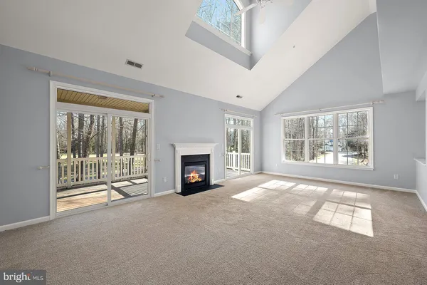 a view of a kitchen with a sink and cabinets
