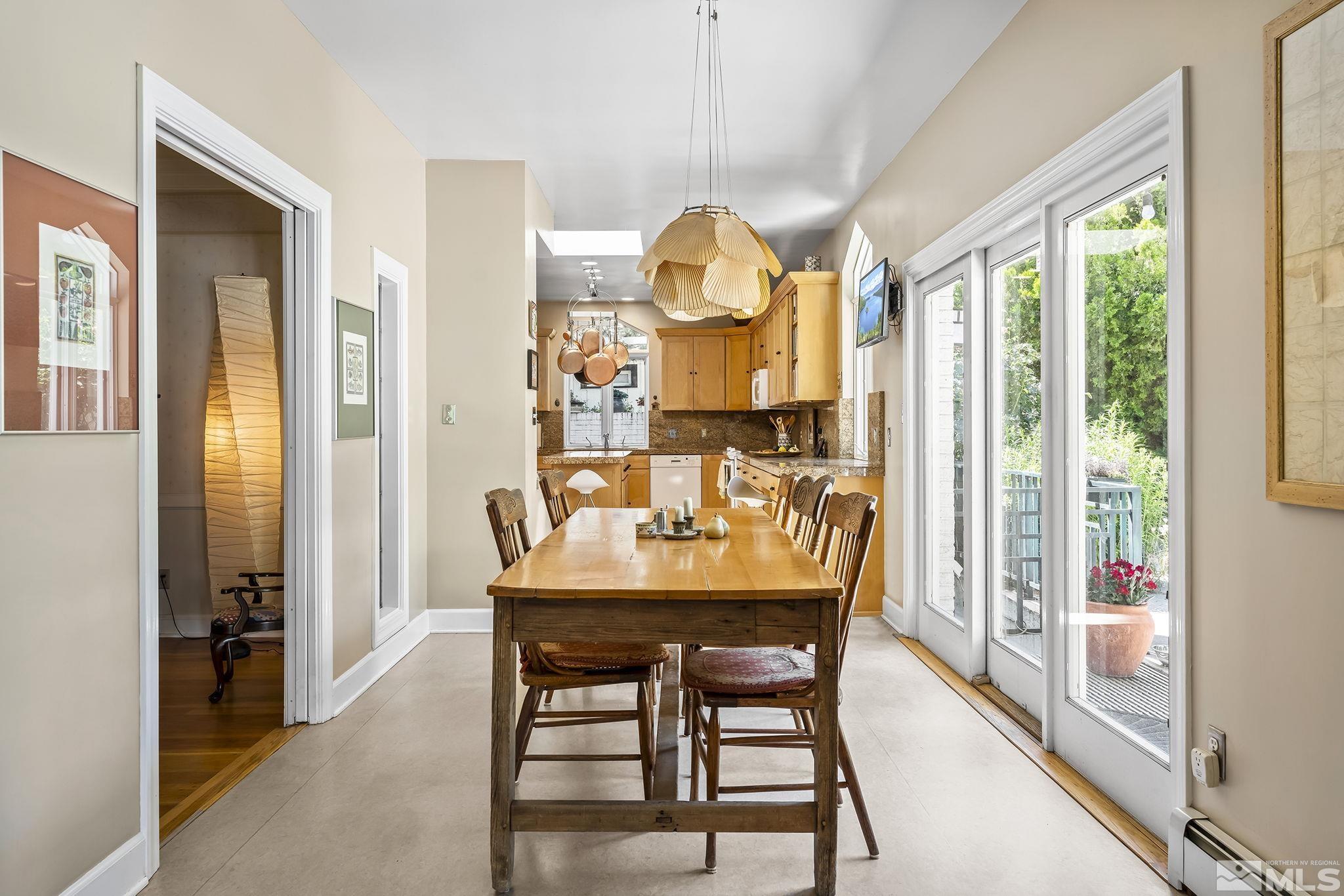 209 Urban Road Reno, NV 89509 - Photo 12 of 34 a dining room with furniture and window