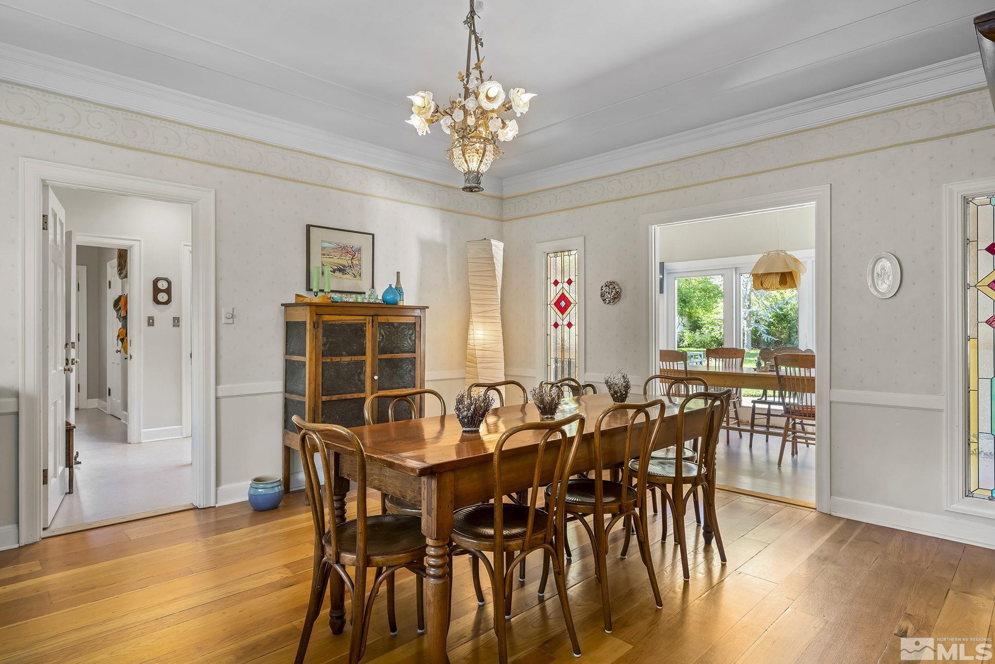209 Urban Road Reno, NV 89509 - Photo 15 of 34 a view of a dining room with furniture and wooden floor