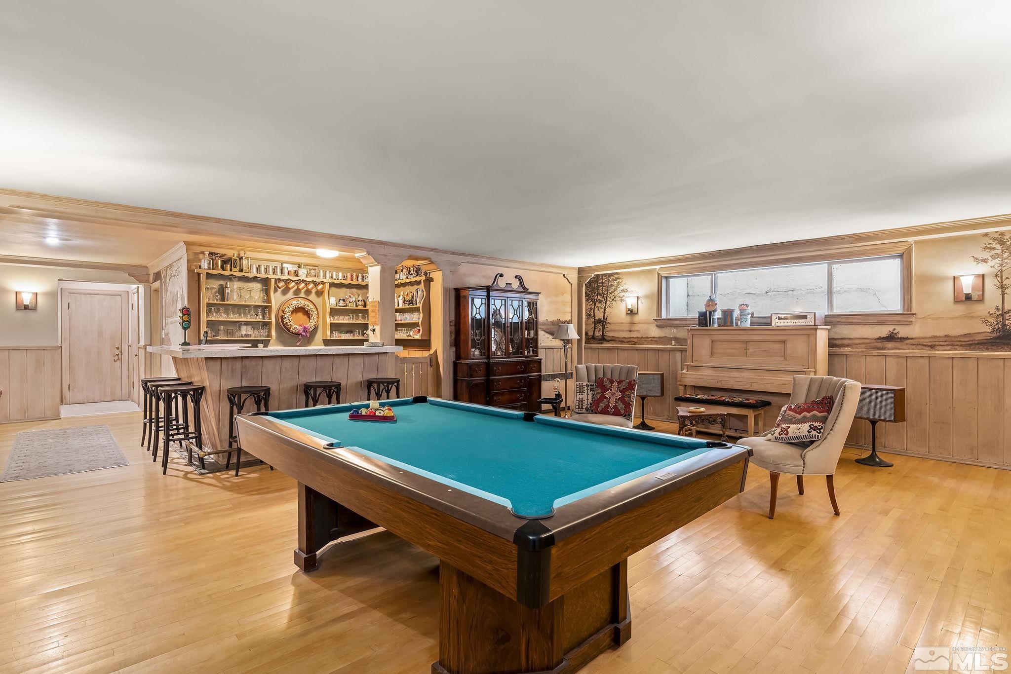 209 Urban Road Reno, NV 89509 - Photo 28 of 34 a room with pool table and windows