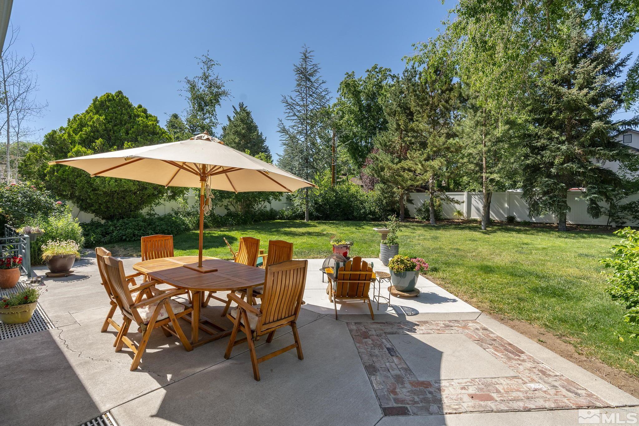 209 Urban Road Reno, NV 89509 - Photo 33 of 34 a view of backyard with outdoor seating and green space