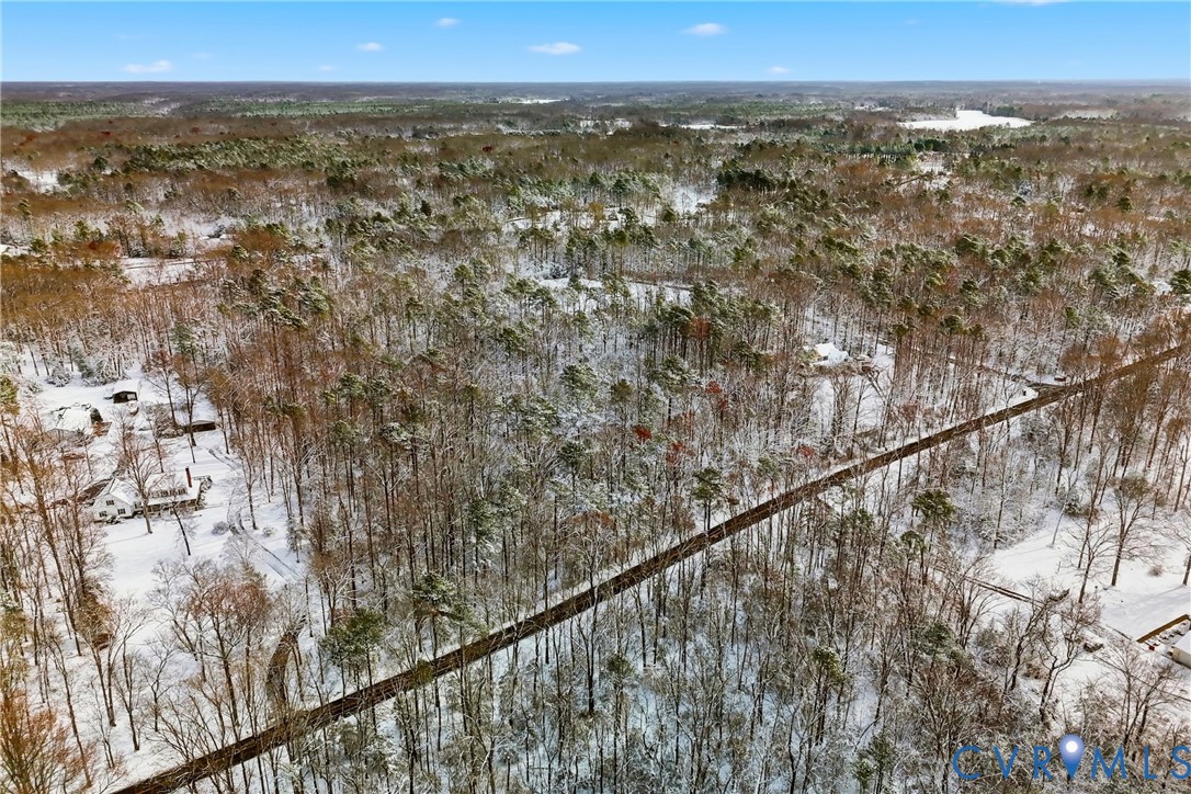 0 McClellan Road Mechanicsville, VA 23111 - Photo 12 of 14 Snowy aerial view featuring a view of trees