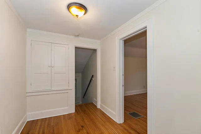a view of kitchen with wooden floor
