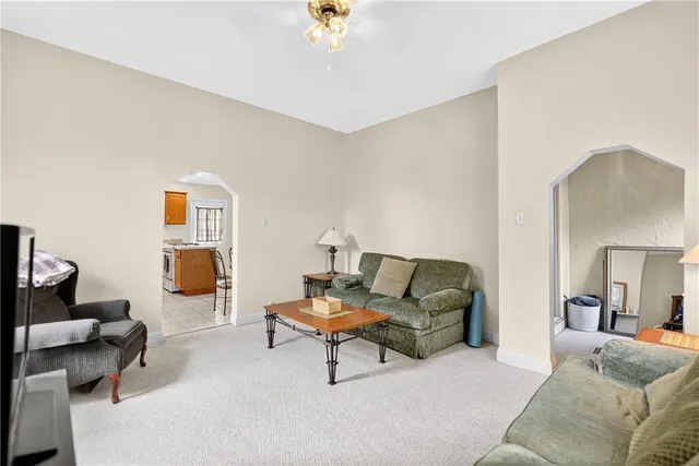 a living room with furniture and a couch