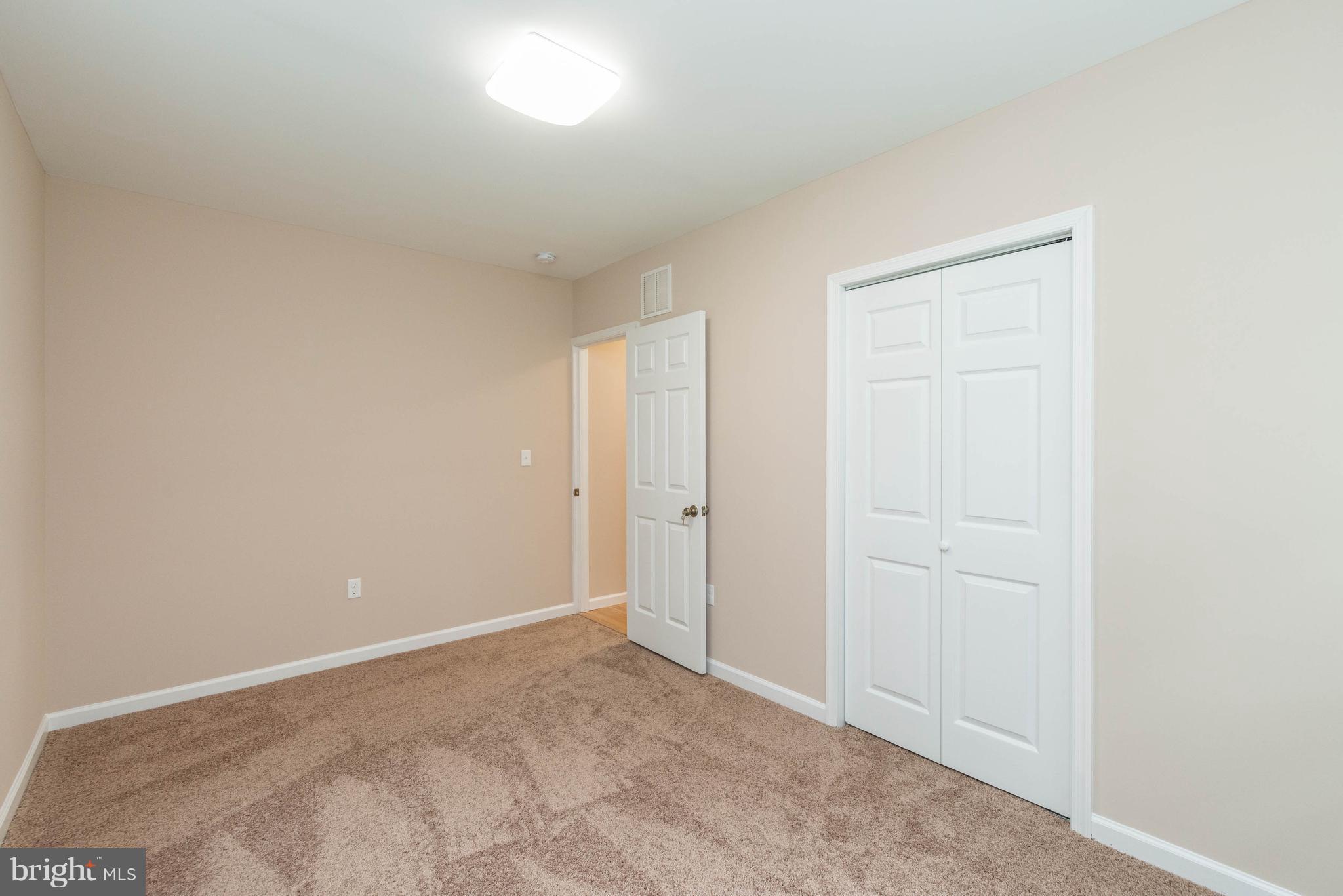 8220 Mission Road Jessup, MD 20794 - Photo 11 of 28 a view of an empty room