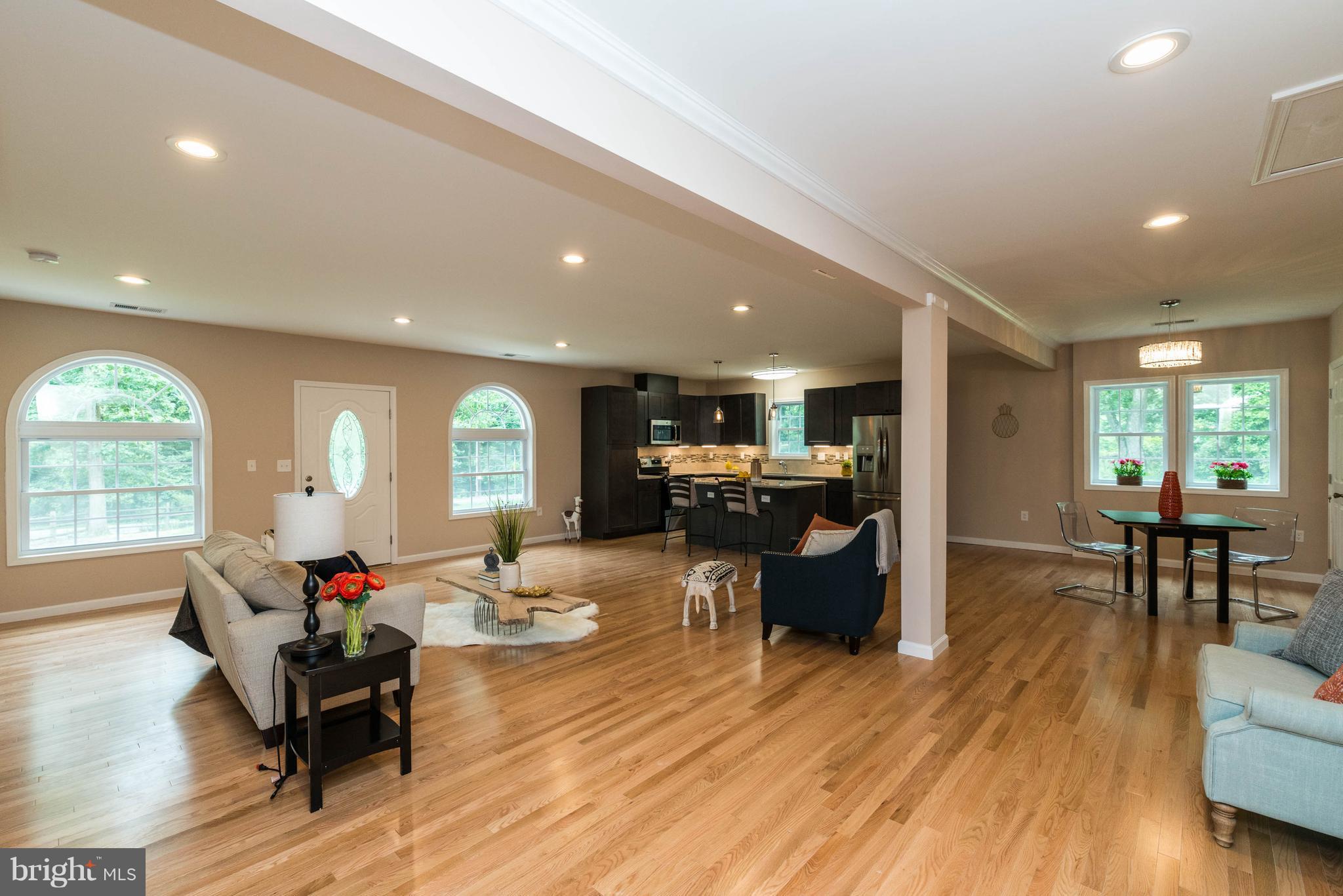 8220 Mission Road Jessup, MD 20794 - Photo 20 of 28 a living room with furniture and a large window