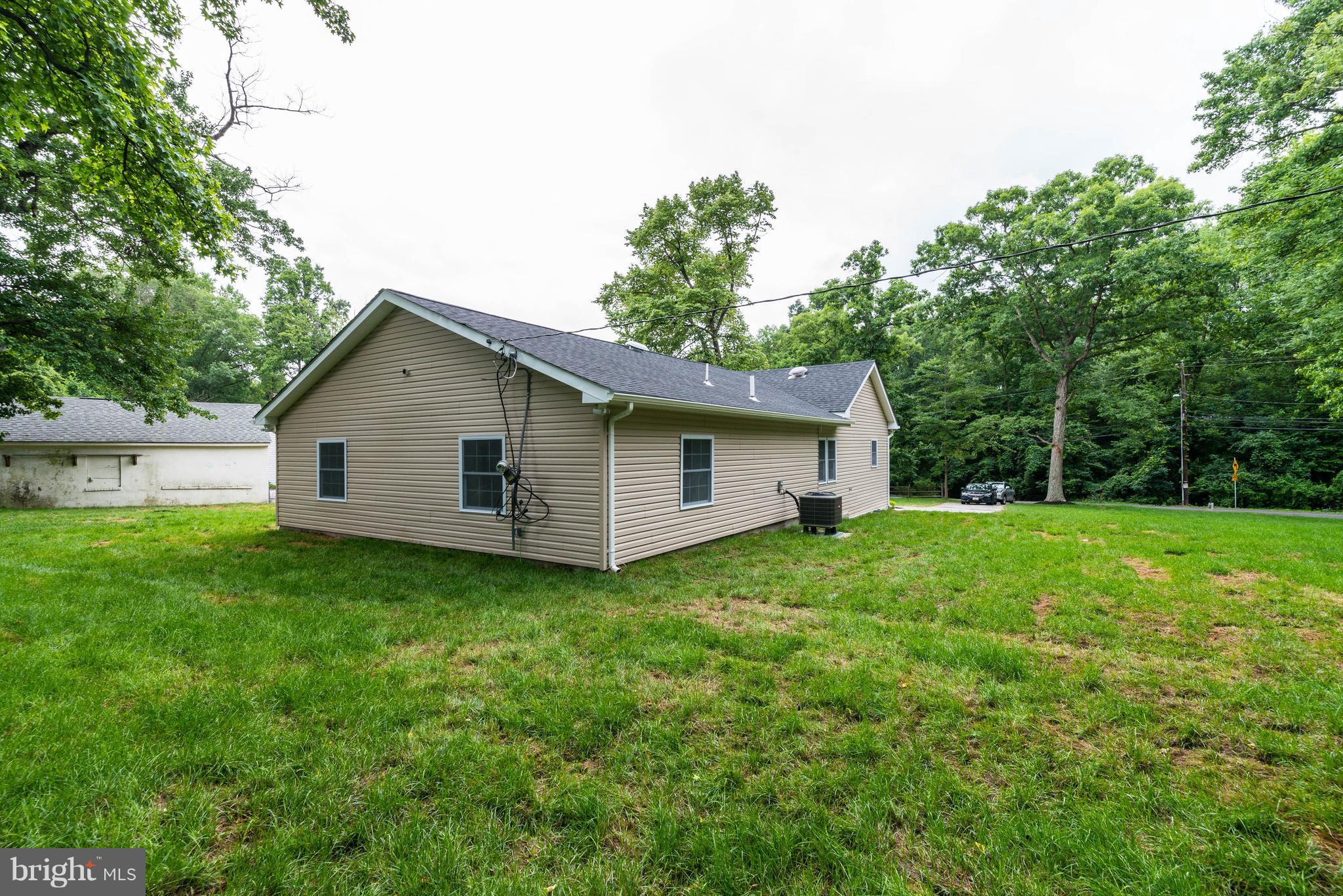 8220 Mission Road Jessup, MD 20794 - Photo 3 of 28 a view of a house with backyard