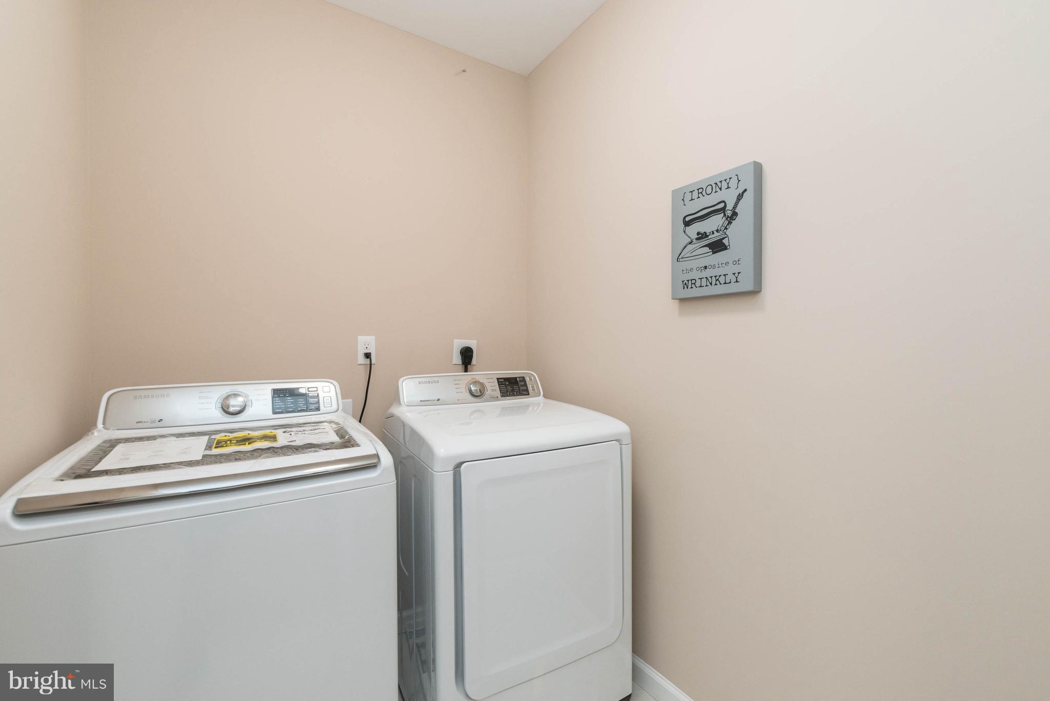 8220 Mission Road Jessup, MD 20794 - Photo 8 of 28 a utility room with dryer and washer