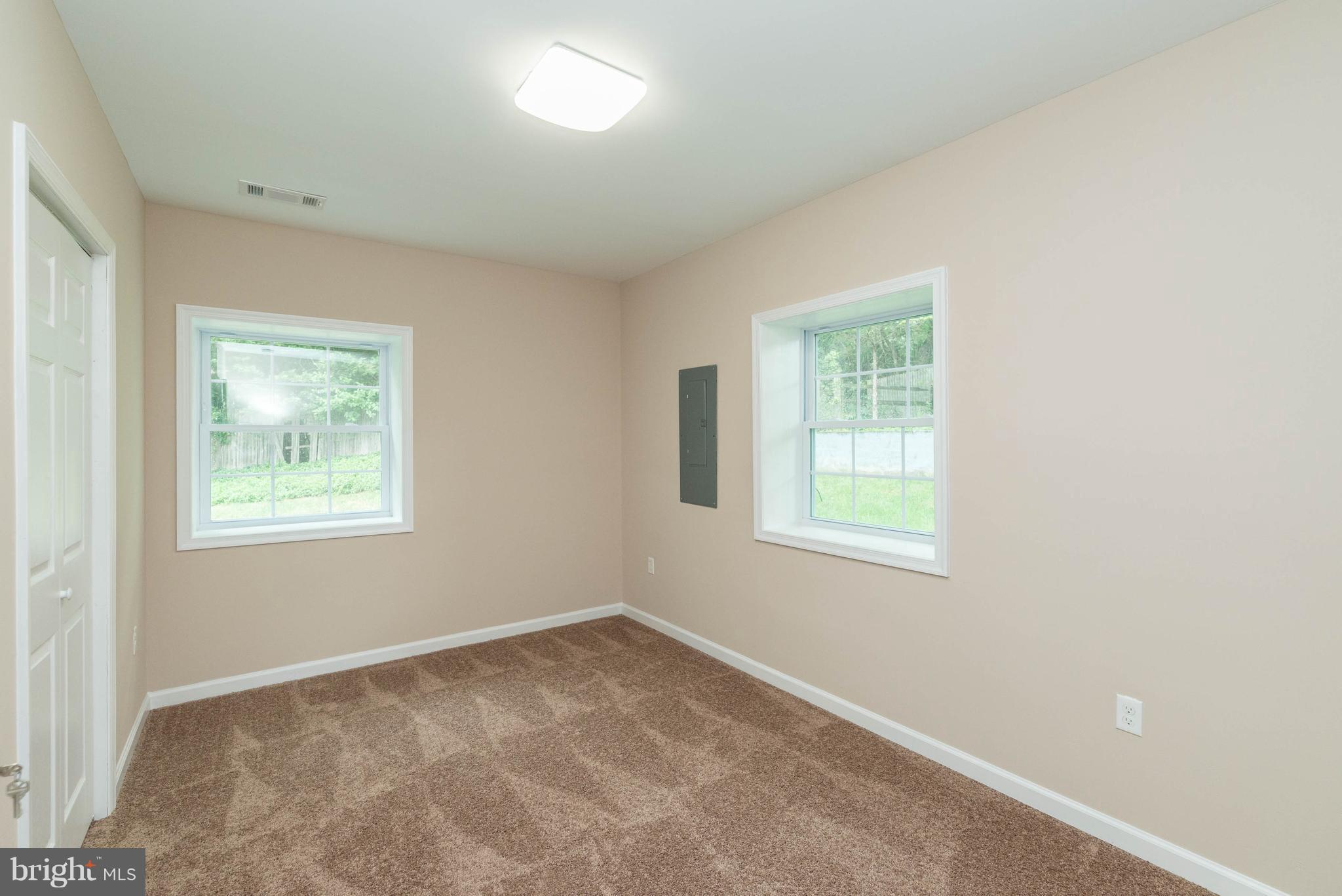 8220 Mission Road Jessup, MD 20794 - Photo 9 of 28 an empty room with a window