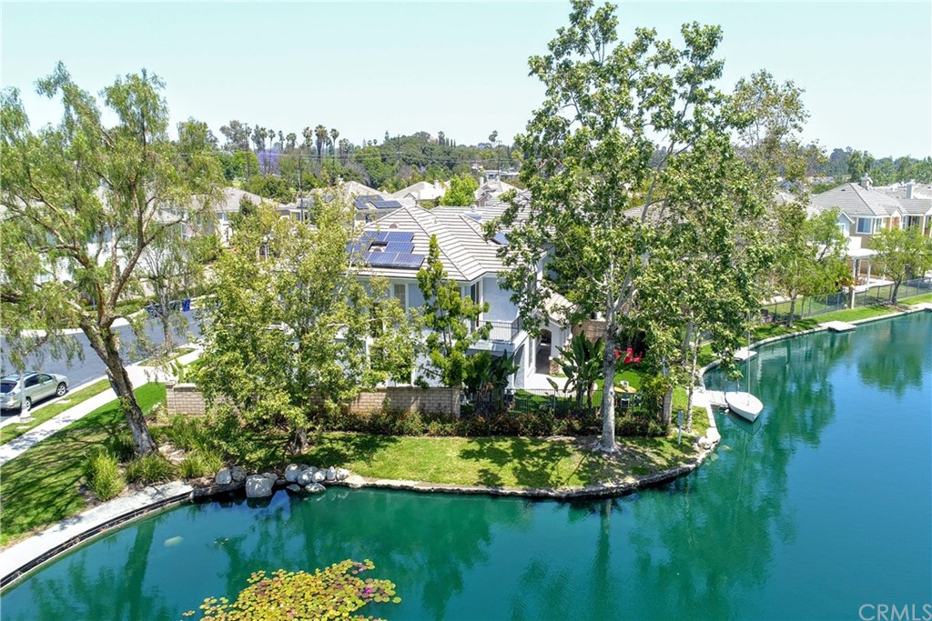 50 Lakeside Drive Buena Park, CA 90621 - Photo 12 of 69 a view of a lake with a house in the background