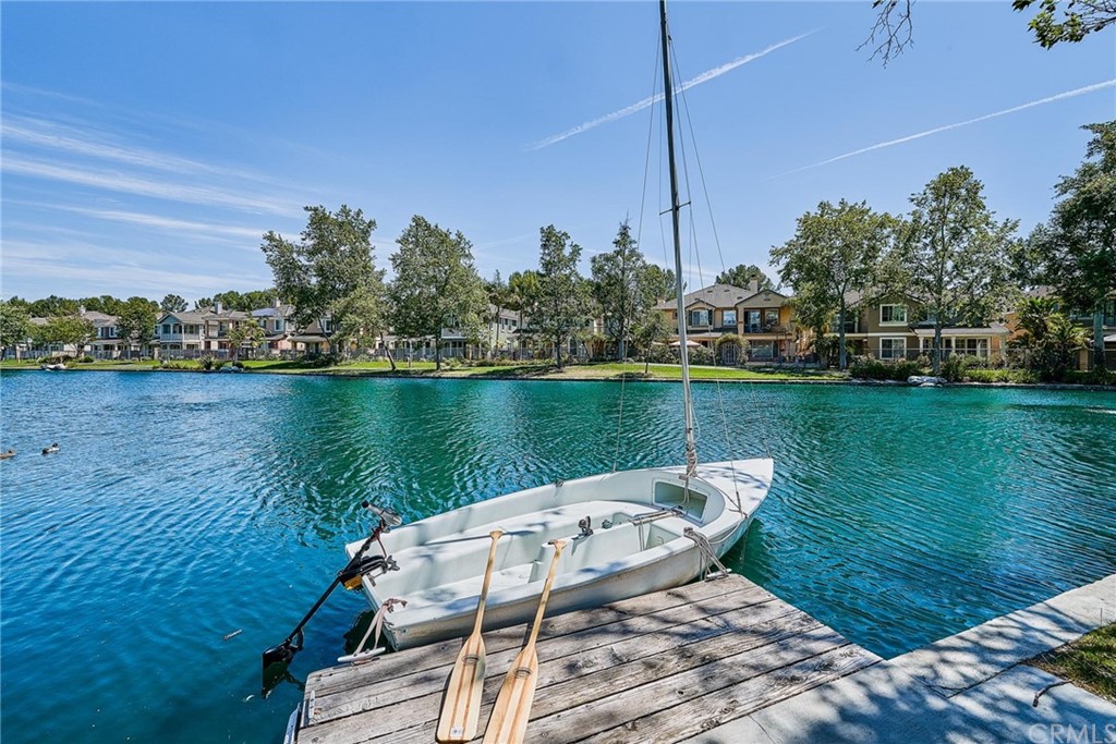 50 Lakeside Drive Buena Park, CA 90621 - Photo 16 of 69 a view of a lake with a yard and potted plants