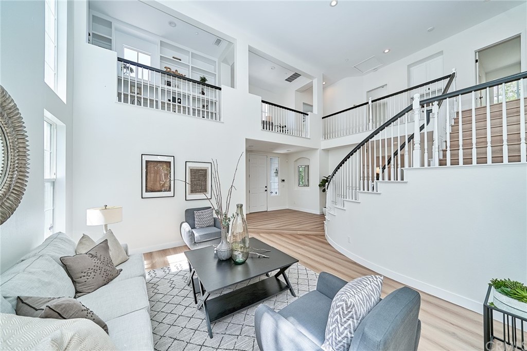 50 Lakeside Drive Buena Park, CA 90621 - Photo 23 of 69 a living room with furniture and a table