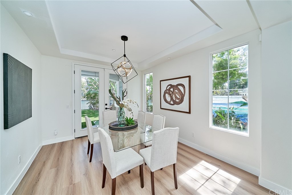 50 Lakeside Drive Buena Park, CA 90621 - Photo 26 of 69 a view of a dining room with furniture window and wooden floor