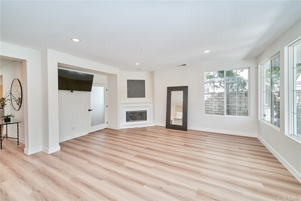 50 Lakeside Drive Buena Park, CA 90621 - Photo 33 of 69 a view of empty room with wooden floor and fan