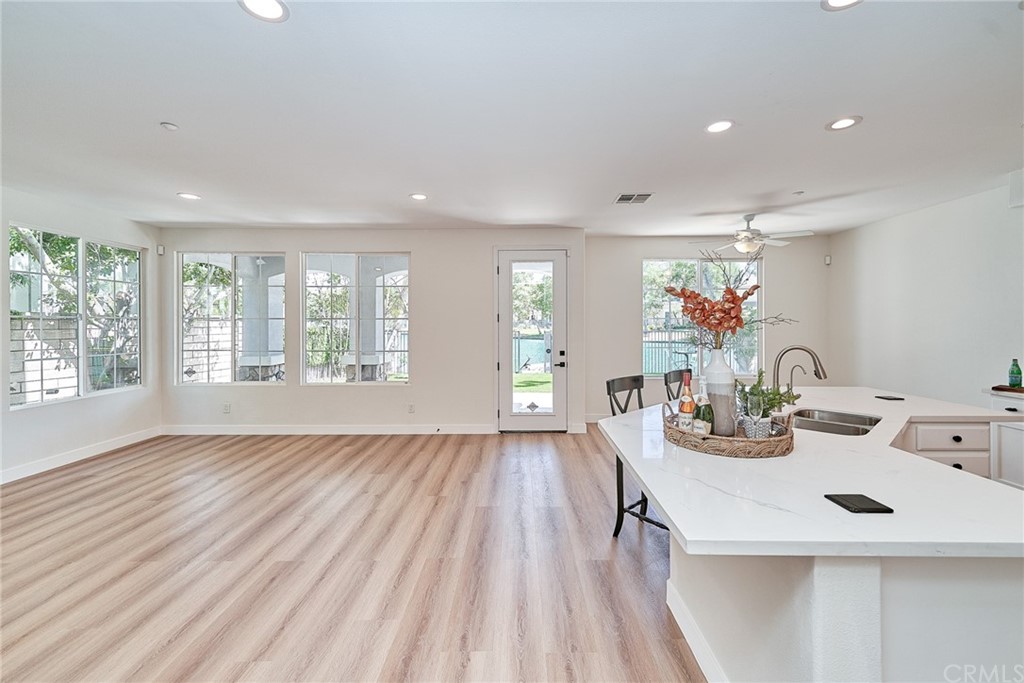 50 Lakeside Drive Buena Park, CA 90621 - Photo 34 of 69 a view of a dining room with furniture window and wooden floor