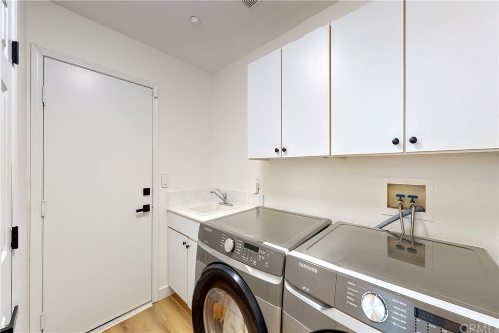 50 Lakeside Drive Buena Park, CA 90621 - Photo 37 of 69 a utility room with dryer and washer