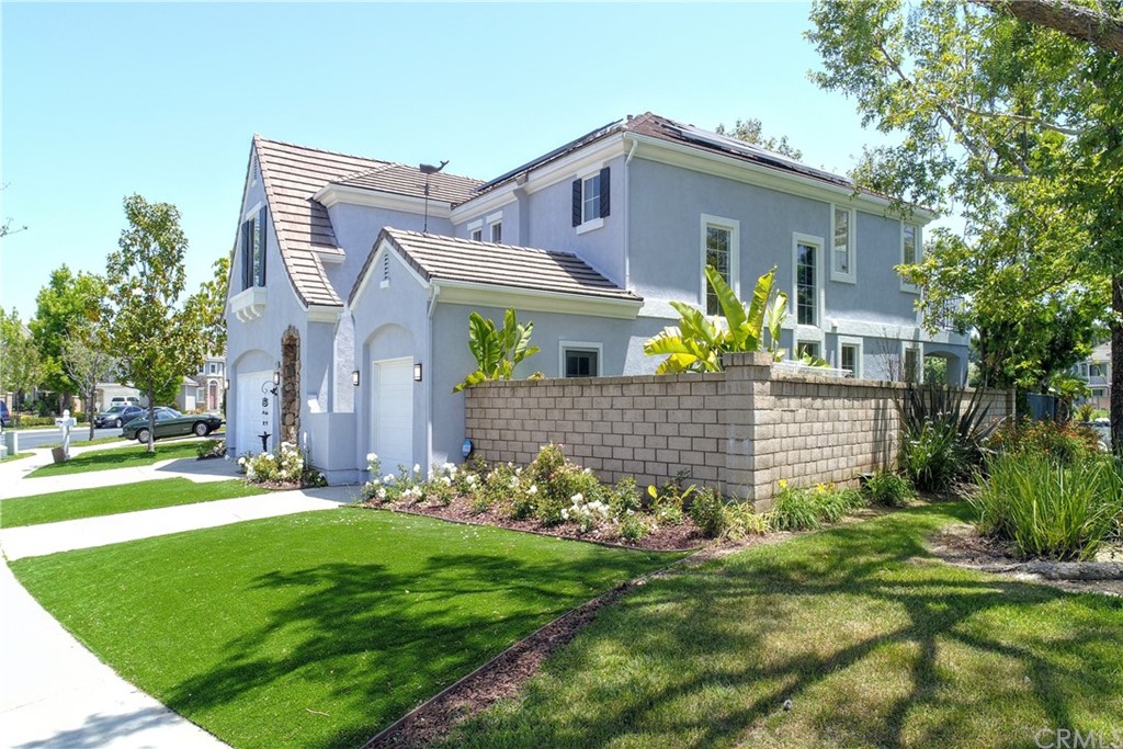 50 Lakeside Drive Buena Park, CA 90621 - Photo 4 of 69 a front view of a house with garden