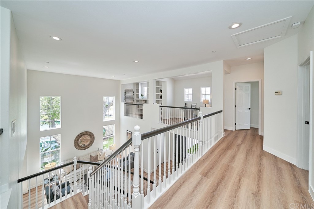 50 Lakeside Drive Buena Park, CA 90621 - Photo 42 of 69 a view of a hallway with wooden floor and windows
