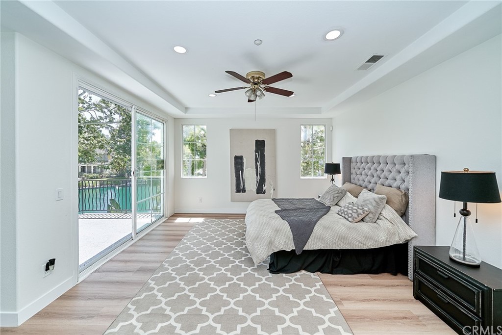 50 Lakeside Drive Buena Park, CA 90621 - Photo 44 of 69 a living room with furniture and a floor to ceiling window