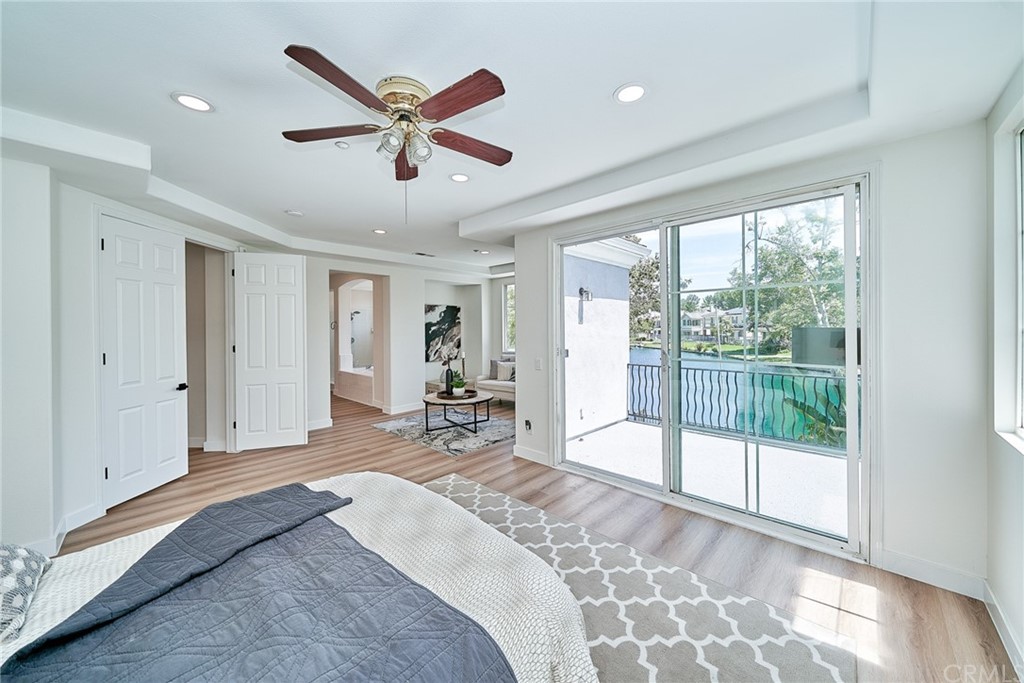 50 Lakeside Drive Buena Park, CA 90621 - Photo 47 of 69 a bed room with a bed and a large window