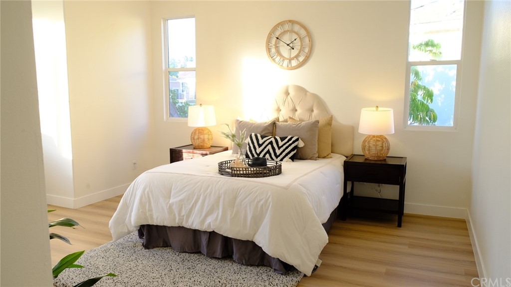 50 Lakeside Drive Buena Park, CA 90621 - Photo 56 of 69 a bedroom with a bed and a window