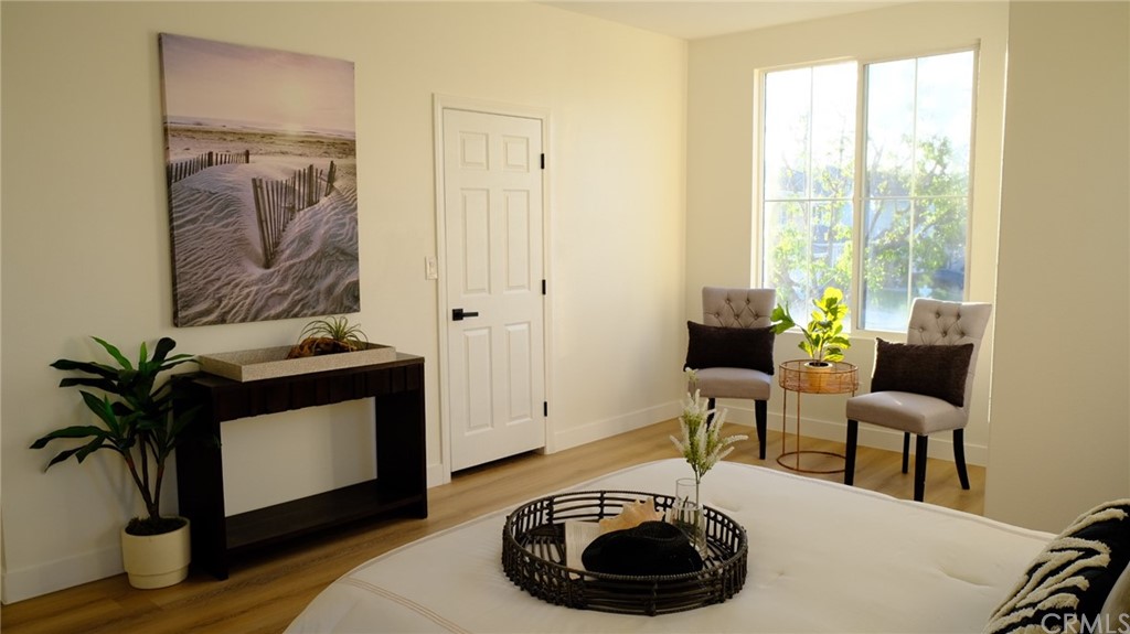 50 Lakeside Drive Buena Park, CA 90621 - Photo 57 of 69 a living room with furniture and a potted plant