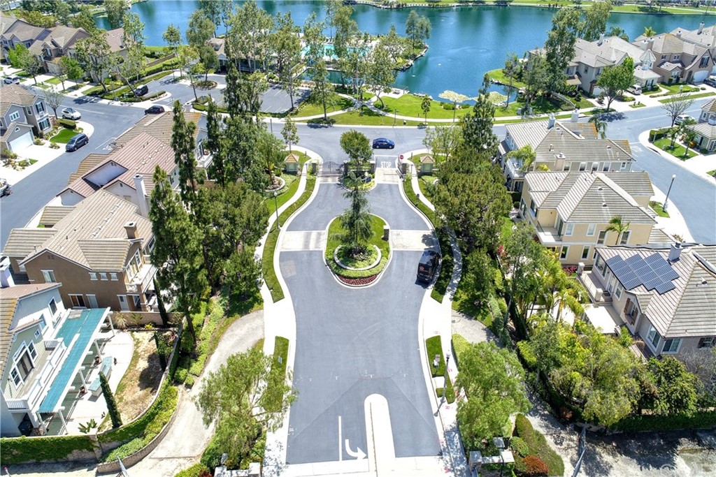 50 Lakeside Drive Buena Park, CA 90621 - Photo 69 of 69 an aerial view of a house with outdoor space and a lake view in back