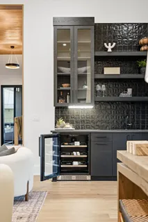 a view of a dining room with furniture and window