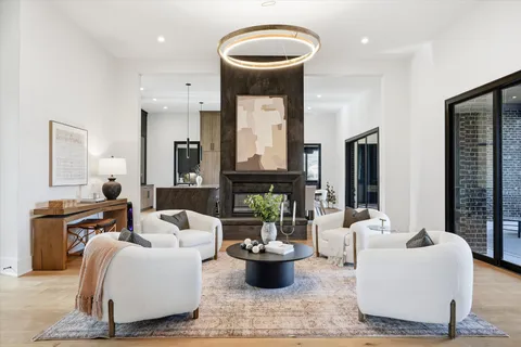 a kitchen with a refrigerator and a sink