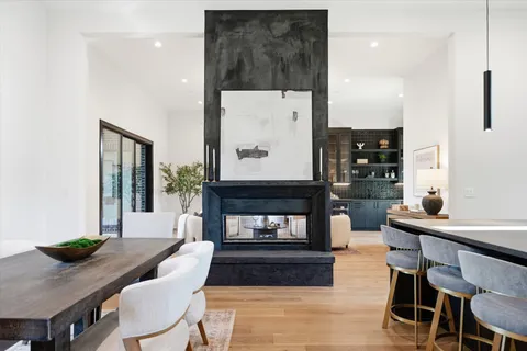 a spacious bathroom with a double vanity sink and a large mirror