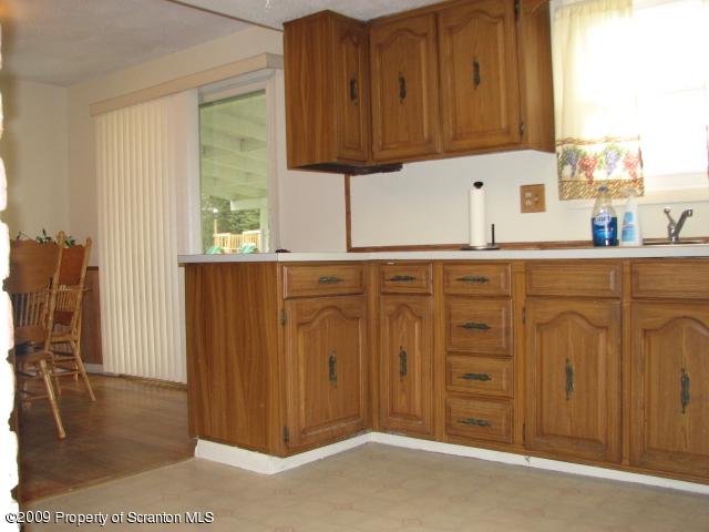 1141 Griffin Road Moscow, PA 18444 - Photo 16 of 19 a view of a kitchen with wooden floor
