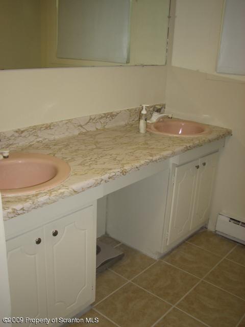1141 Griffin Road Moscow, PA 18444 - Photo 8 of 19 a bathroom with a sink and a vanity