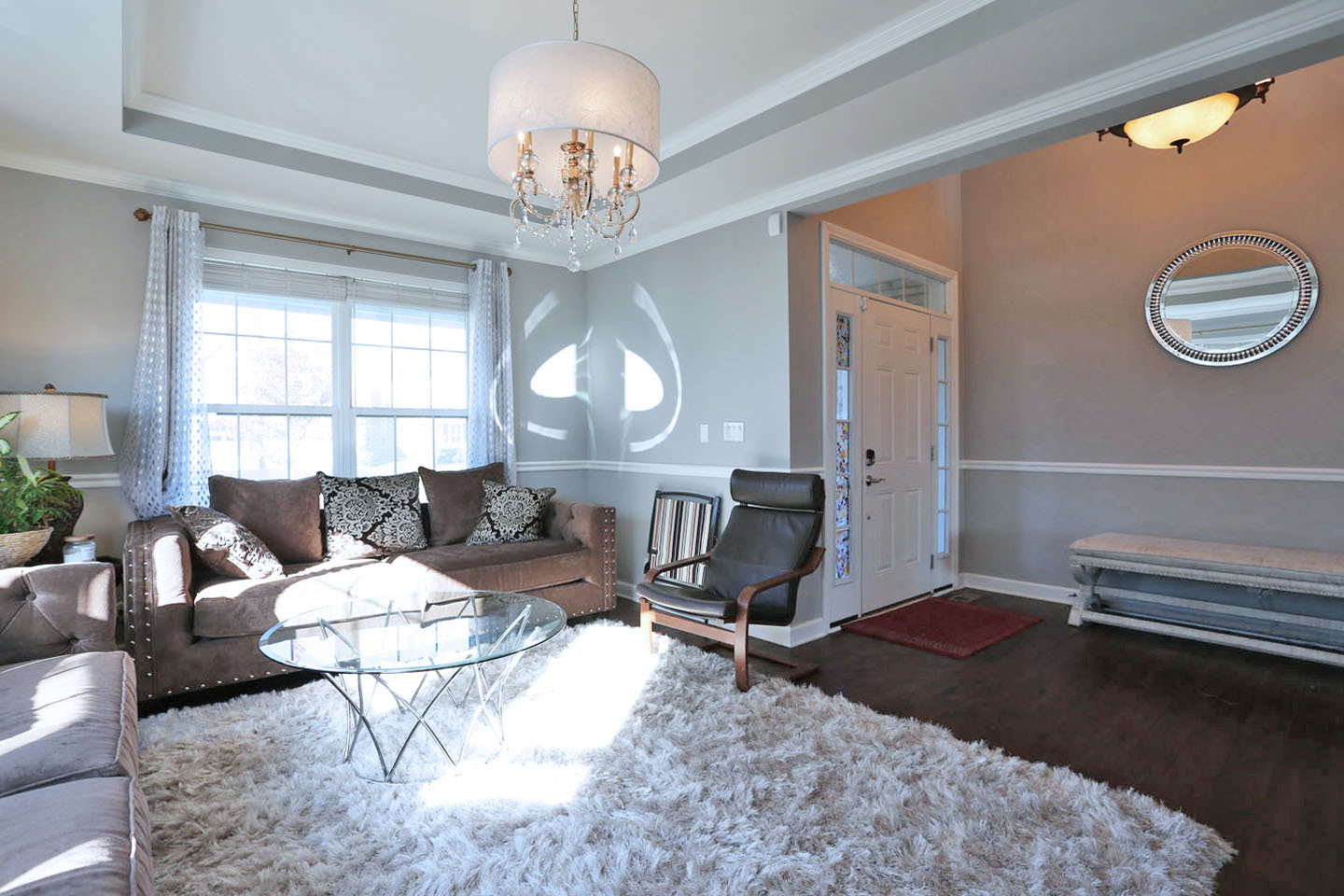 3441 Harold Circle Hoffman Estates, IL 60192 - Photo 15 of 34 a living room with furniture chandelier and a window