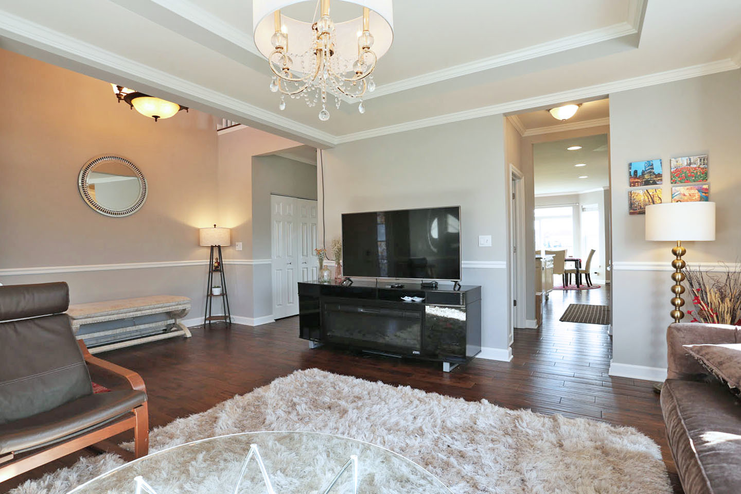 3441 Harold Circle Hoffman Estates, IL 60192 - Photo 16 of 34 a living room with furniture and a flat screen tv
