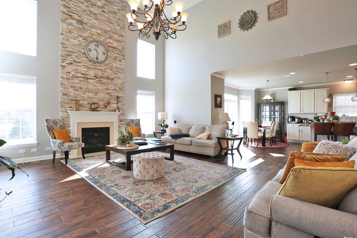 3441 Harold Circle Hoffman Estates, IL 60192 - Photo 2 of 34 a living room with furniture or fireplace and a chandelier