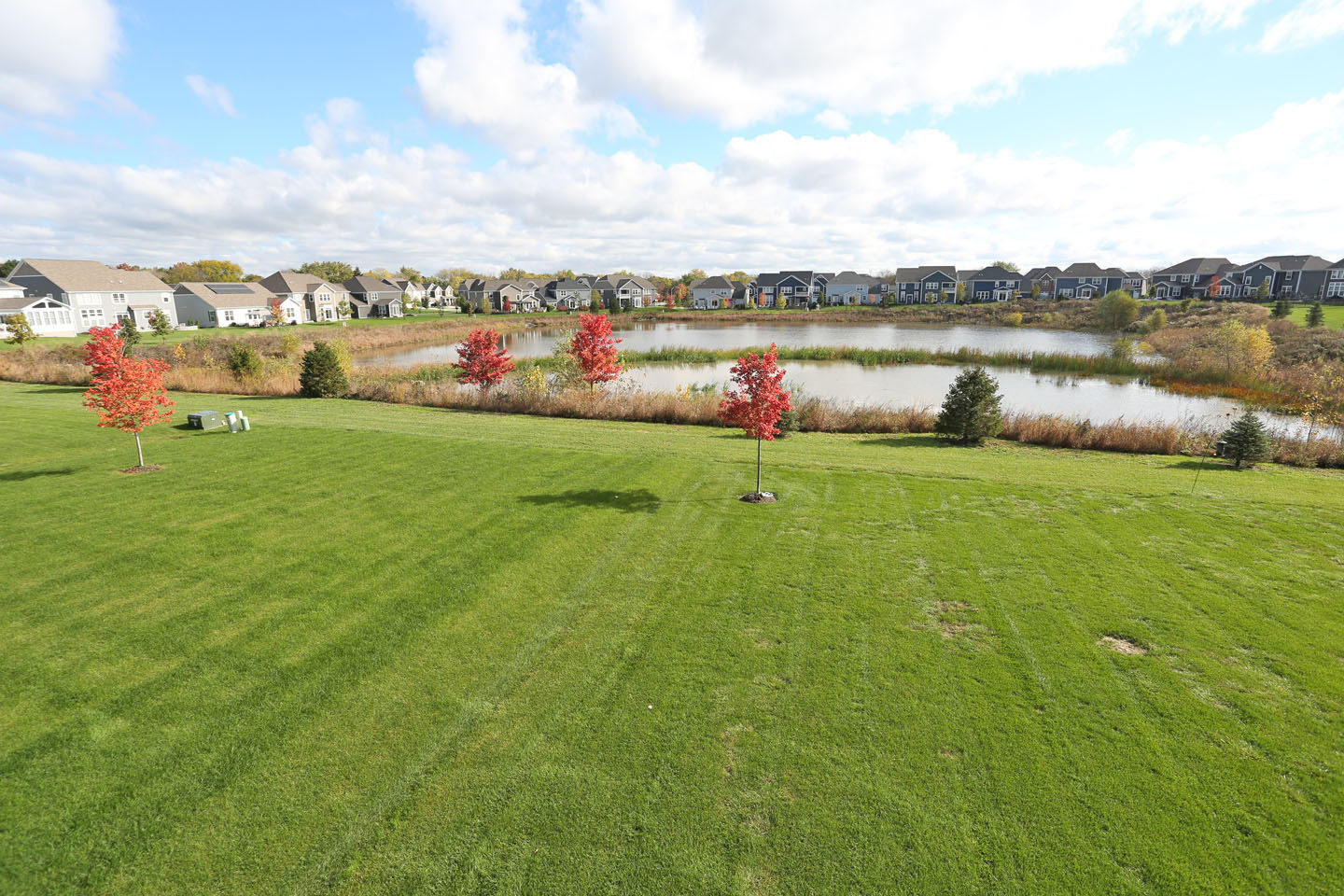 3441 Harold Circle Hoffman Estates, IL 60192 - Photo 33 of 34 a view of a lake with houses in the back
